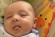 Seven_week_old_baby_says_hello_to_mum